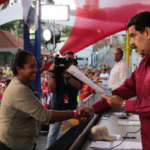 Maduro hands over Property Deeds for collective organisation, May 2018.